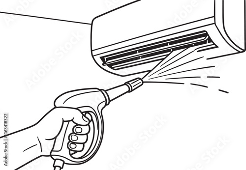 technician sprays water jet to clean air conditioner