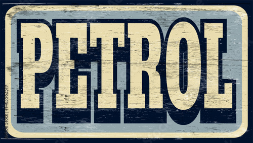 Aged retro petrol sign on wood