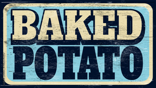 Aged and worn baked potato sign on wood