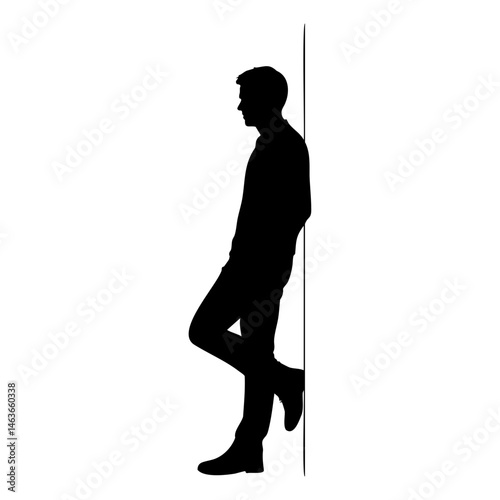 Silhouette of man leaning against a wall