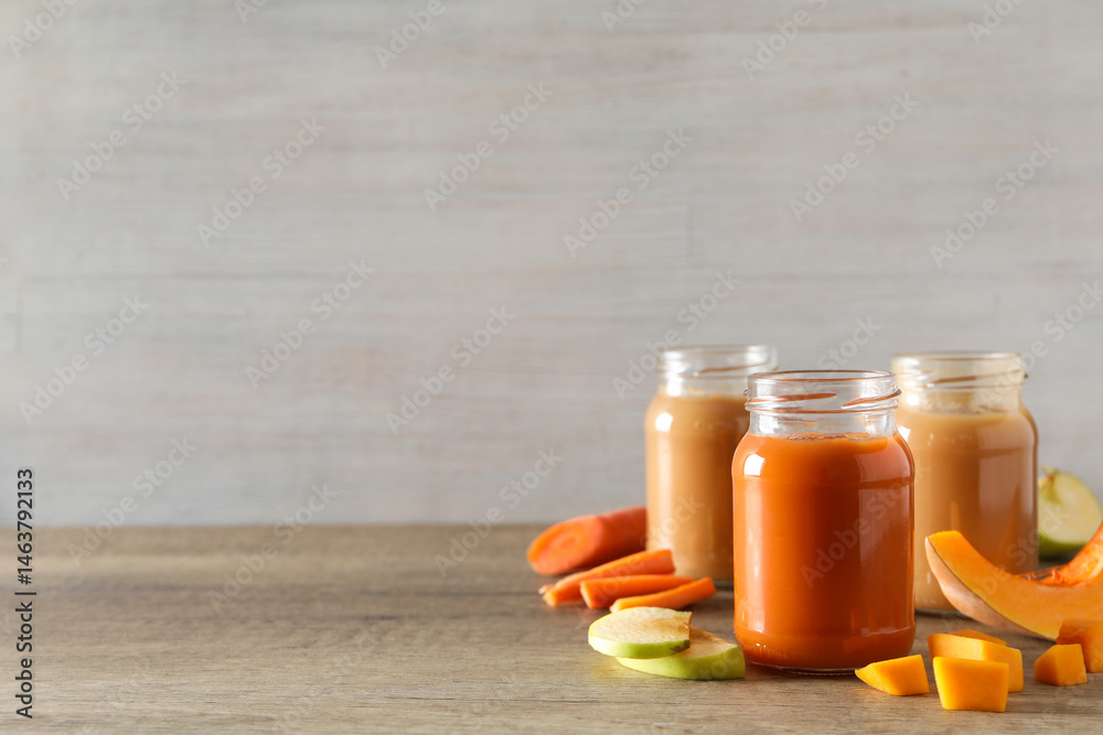 Children's vegetable and fruit puree, on a light background.