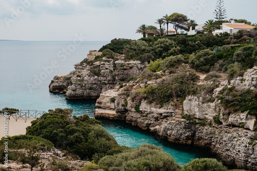 Rocky coastline and cove at Cala en Brut, Menorca