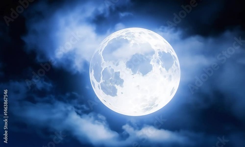Ethereal Full Moon Ascends Through Deep Blue Cloudy Night Sky Video
