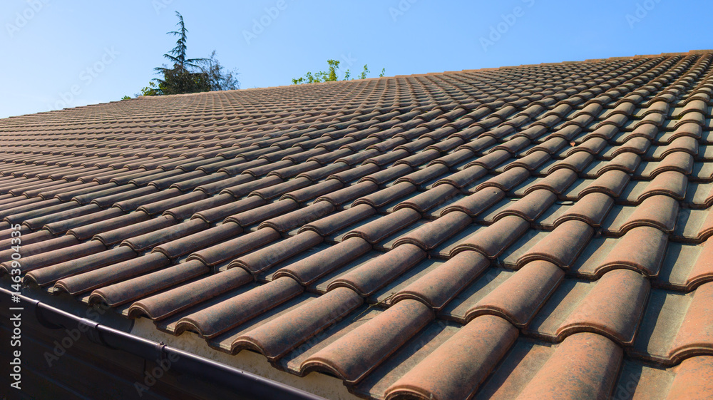 roof tiles on building roof red corrugated tile element of home pattern top house background with sky