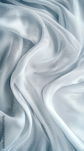 A close up of soft white silk fabric, elegantly flowing with smooth folds, creating a delicate and luxurious feel.