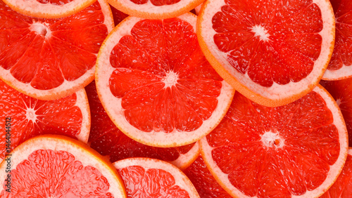 Fototapeta Naklejka Na Ścianę i Meble -  Grapefruit pattern. Top view citrus fruits. Close up.