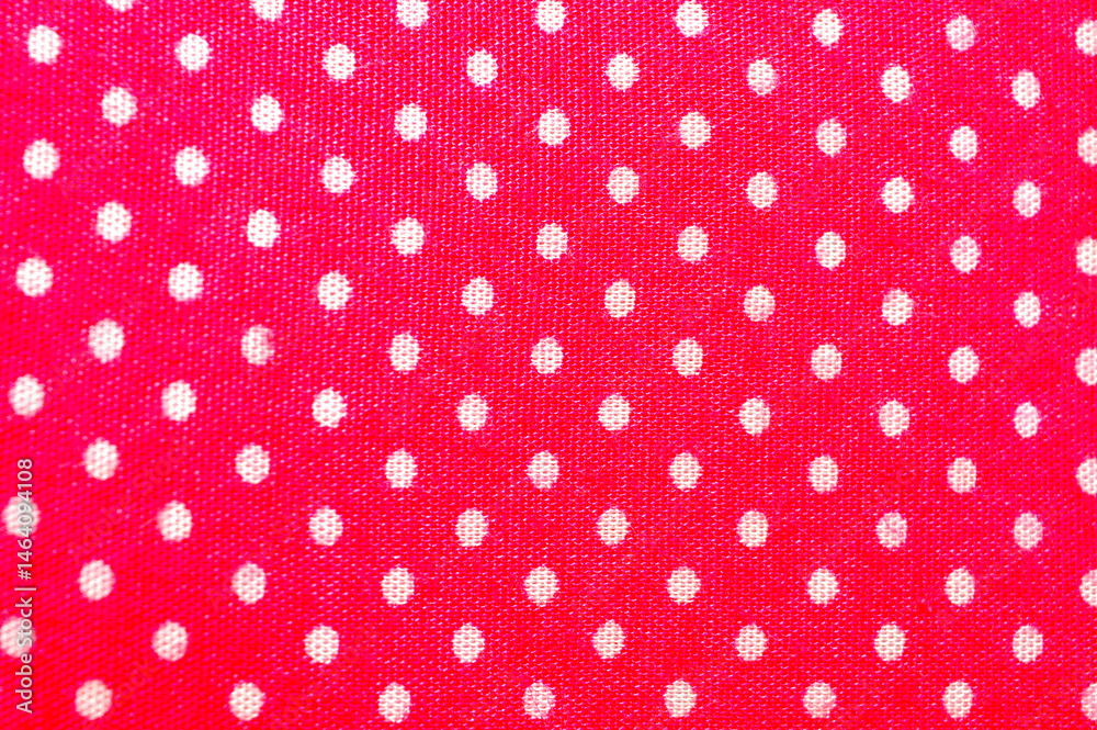 Seamless red pattern with white polka dots, on fabric Seamless red pattern with white polka dots, on fabric