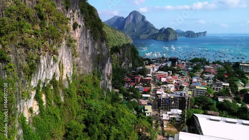 Wallpaper Mural Vibrant aerial panorama of El Nido showing the town, dramatic cliffs, tropical sea, and islands of Bacuit Bay, Palawan, Philippines. Torontodigital.ca