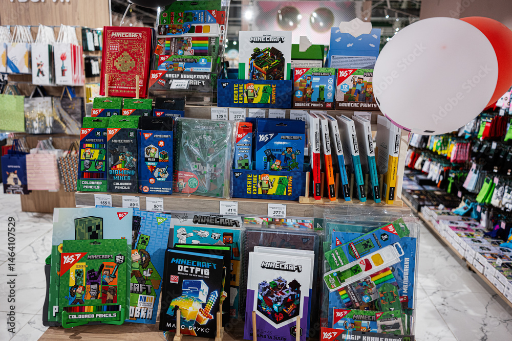 Fototapeta premium Display of Minecraft themed stationery products in a colorful and organized arrangement