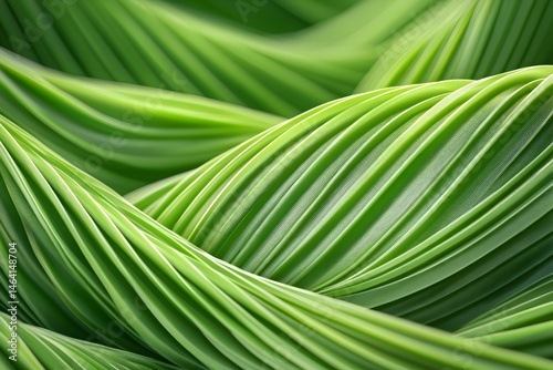 Abstract green waves with ribbed texture, creating a flowing, organic pattern