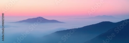Silhouetted hills shrouded in thick fog, minimalist style , mountains, photo