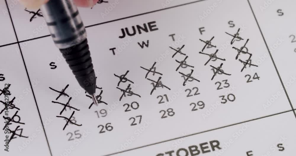 Someone is using a black pen to mark every date in June off a printed calendar. They put multiple x's over each date, symbolizing the passing of time or counting down the days. Dates On Calendar