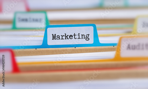 File folders with a tab labeled Marketing
