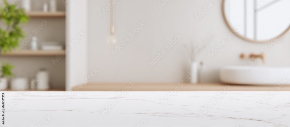 Minimalist bathroom with a white countertop, round mirror, wooden shelves, and soft natural lighting.