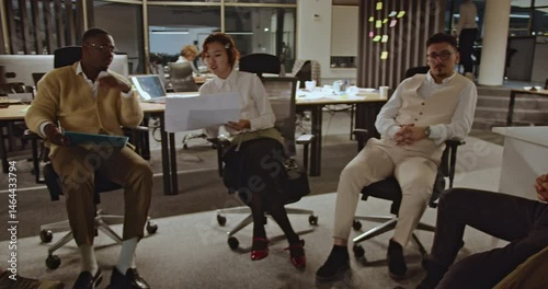 Wallpaper Mural A diverse team of business professionals collaborates in a modern office, engaging in a productive meeting to discuss ideas and strategies. Torontodigital.ca