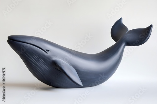 Ceramic whale sculpture with a matte navy blue finish, showcasing the beauty and elegance of marine wildlife