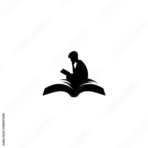 Silhouette of a young male figure deeply engaged in reading a book, embodying the essence of knowledge and discovery.