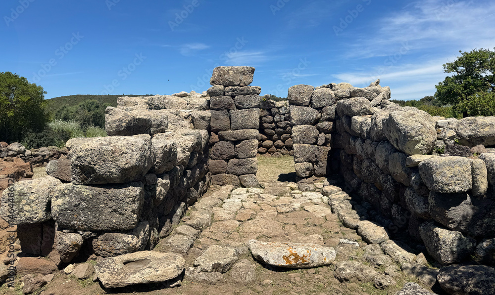 Ancient stone-lined sacred well filled with water, part of the Nuragic sanctuary of Santa Vittoria in Serri Ancient stone-lined sacred well filled with water, part of the Nuragic sanctuary of Santa Vittoria in Serri