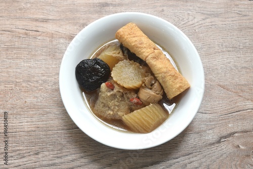 Obraz na płótnie boiled slice radish with tofu and black mushroom soup vegetarian food on bowl w salonie