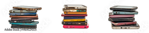 Set of a stack of old and worn mobile phones, isolated on a transparent background.