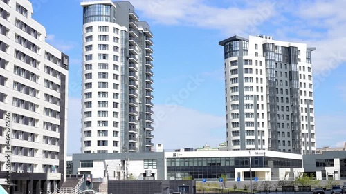 new residential area of multi-storey buildings against the blue sky on a sunny day