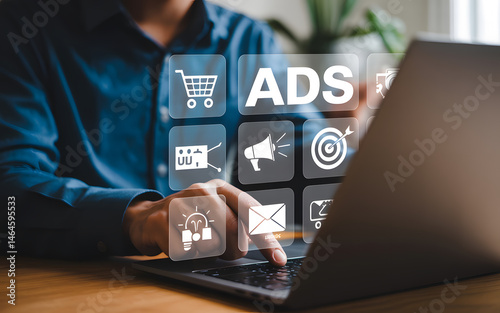 Digital marketing professional working on online advertising campaigns promoting brands using modern technology