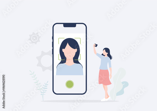 スマホのカメラで自分の顔を撮影する若い女性