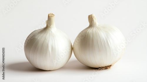 Obraz na płótnie Two Pearl White Onions on White Background w salonie
