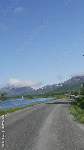 Vertical view of Norway road from car