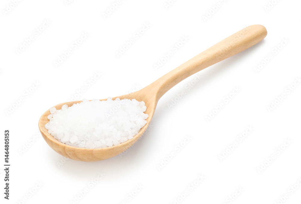 Natural salt in spoon isolated on white Natural salt in spoon isolated on white