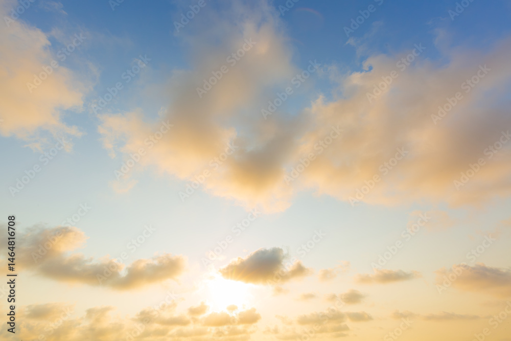 Fototapeta premium Golden sky and clouds,Beautiful , luxury soft gradient orange gold clouds and sunlight on the blue sky perfect for the background, take in everning,Twilight, Large size, high definition landscape phot