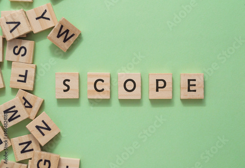 Jumble of letters and the word scope is written on a green background