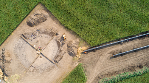 Aerial view of gas and oil pipeline construction and archeological excavations. Big pipeline is under construction.