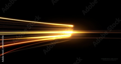 Abstract golden light streaks on black background.