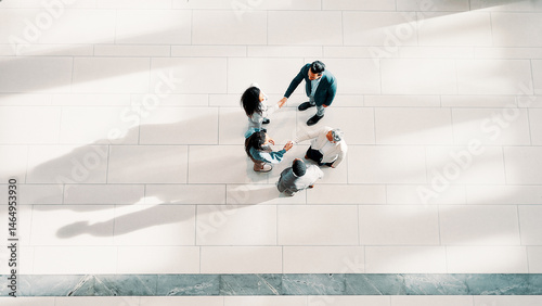 Handshake, greeting and business people in office from top view for introduction, welcome or agreement. Collaboration, partnership and financial managers with stakeholder for investment deal together