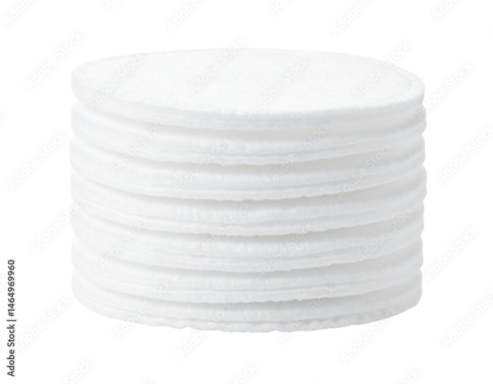 Obraz premium A stack of round cotton pads used for skincare or makeup removal.