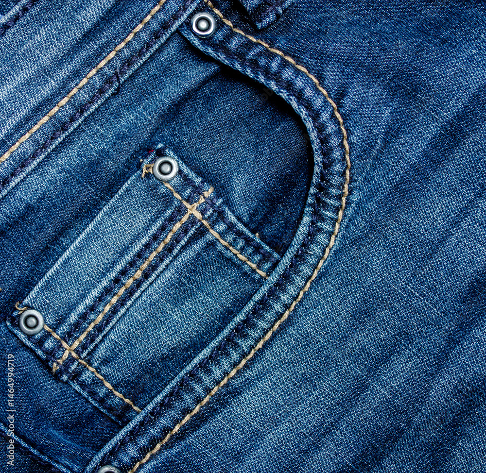 Close-up of a pocket on jeans with buttons