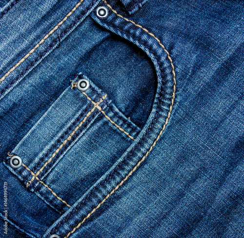 Obraz na płótnie Close-up of a pocket on jeans with buttons w salonie