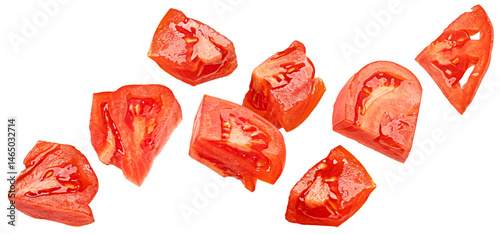 Fotografi Falling chopped tomatoes isolated on white background with clipping path