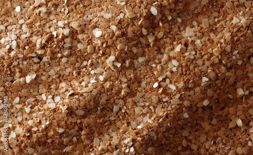 Obraz na płótnie Brown Sugar Granules Glistening Under Soft Light in a Culinary Setting w salonie