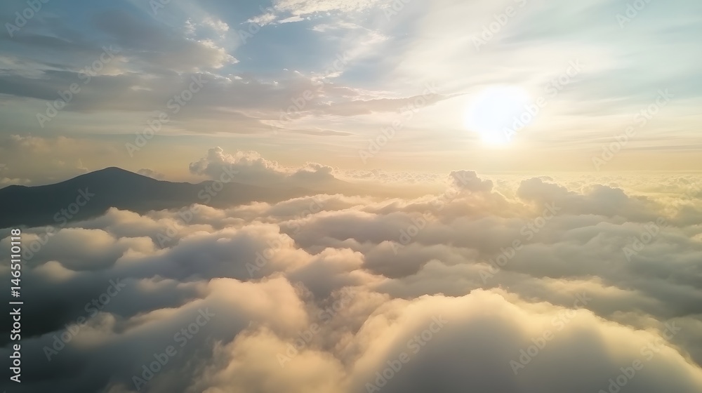 Dramatic mountain landscape with layers of clouds and a vibrant sky during the golden hour of sunrise or sunset Dramatic mountain landscape with layers of clouds and a vibrant sky during the golden hour of sunrise or sunset