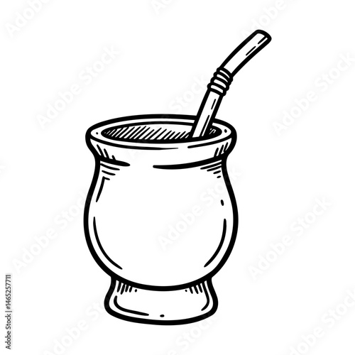 Traditional mate drink with straw in a decorative cup  