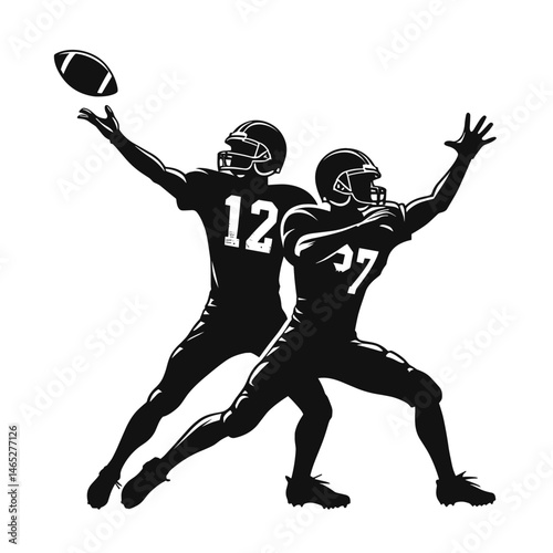 Football players leaping mid-game in silhouette
