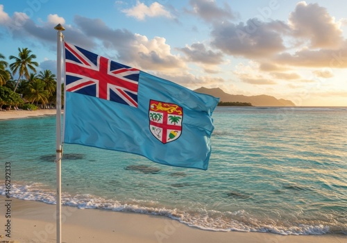 Waving Fijian Flag Symbolizing Pacific Paradise Over Pristine Beaches and Turquoise Coral Reef Waters photo