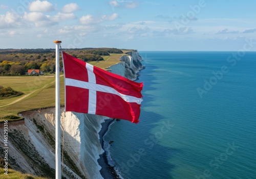 Waving Danish Flag (Dannebrog) Symbolizing Nordic History Against the White Chalk Cliffs of Møns Klint
