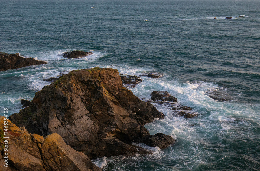 Waves Crashing Against Rugged Cliffs on the Cornwall Coast Waves Crashing Against Rugged Cliffs on the Cornwall Coast