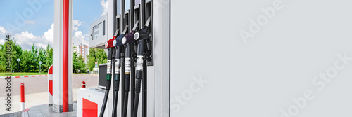 Long Banner, filling station with petrol and diesel hoses.