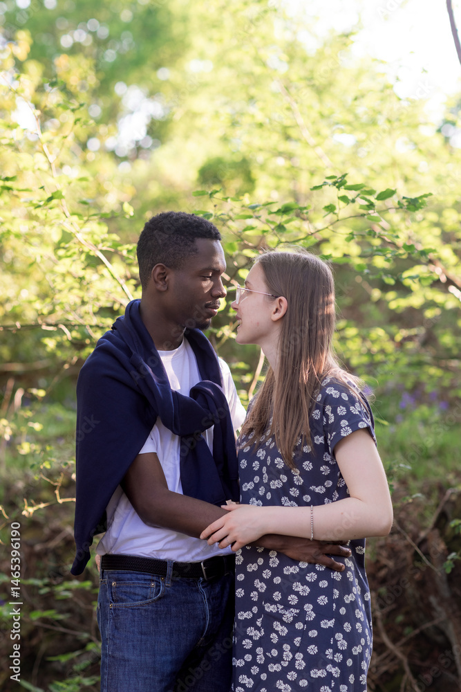 Fototapeta premium Romantic Mixed Race Couple in Summer field