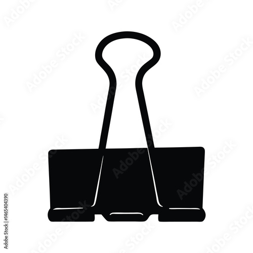 Black binder clip on white background for office supplies and stationery