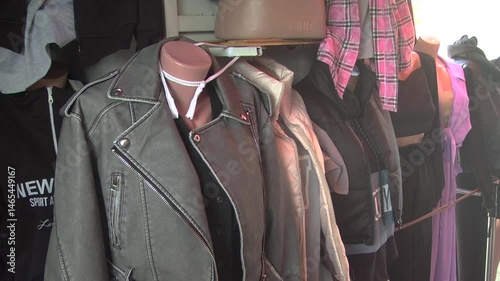 gray leather jacket on mannequin